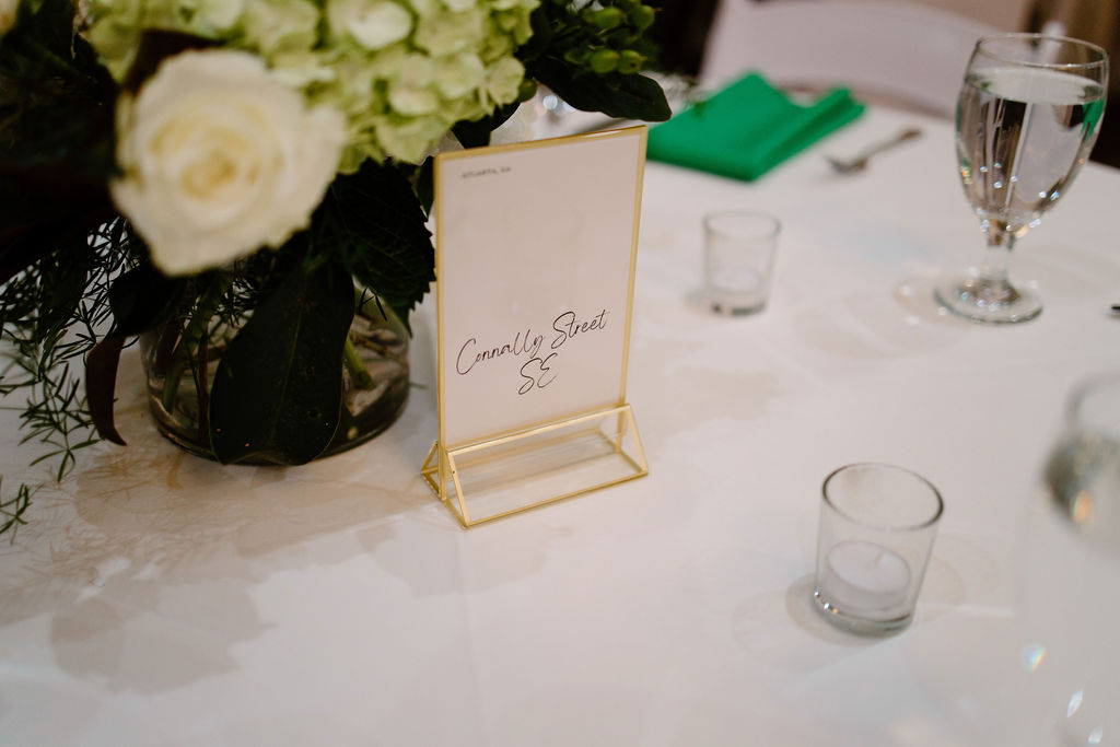 Wedding table decor with personalized table numbers to make add personality to their wedding.