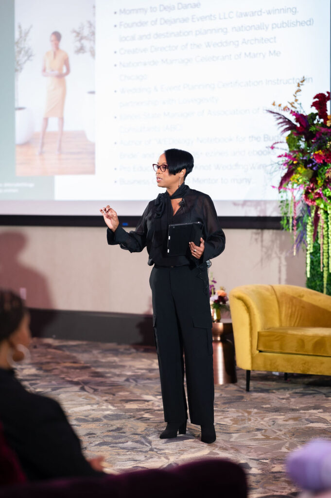 Desiree Dent speaking on business development at the 2024 Becoming Retreat, a business conference for women
